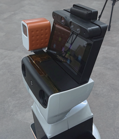 Visible and long-wavelength infrared coaxial camera mounted on  Human Support Robot